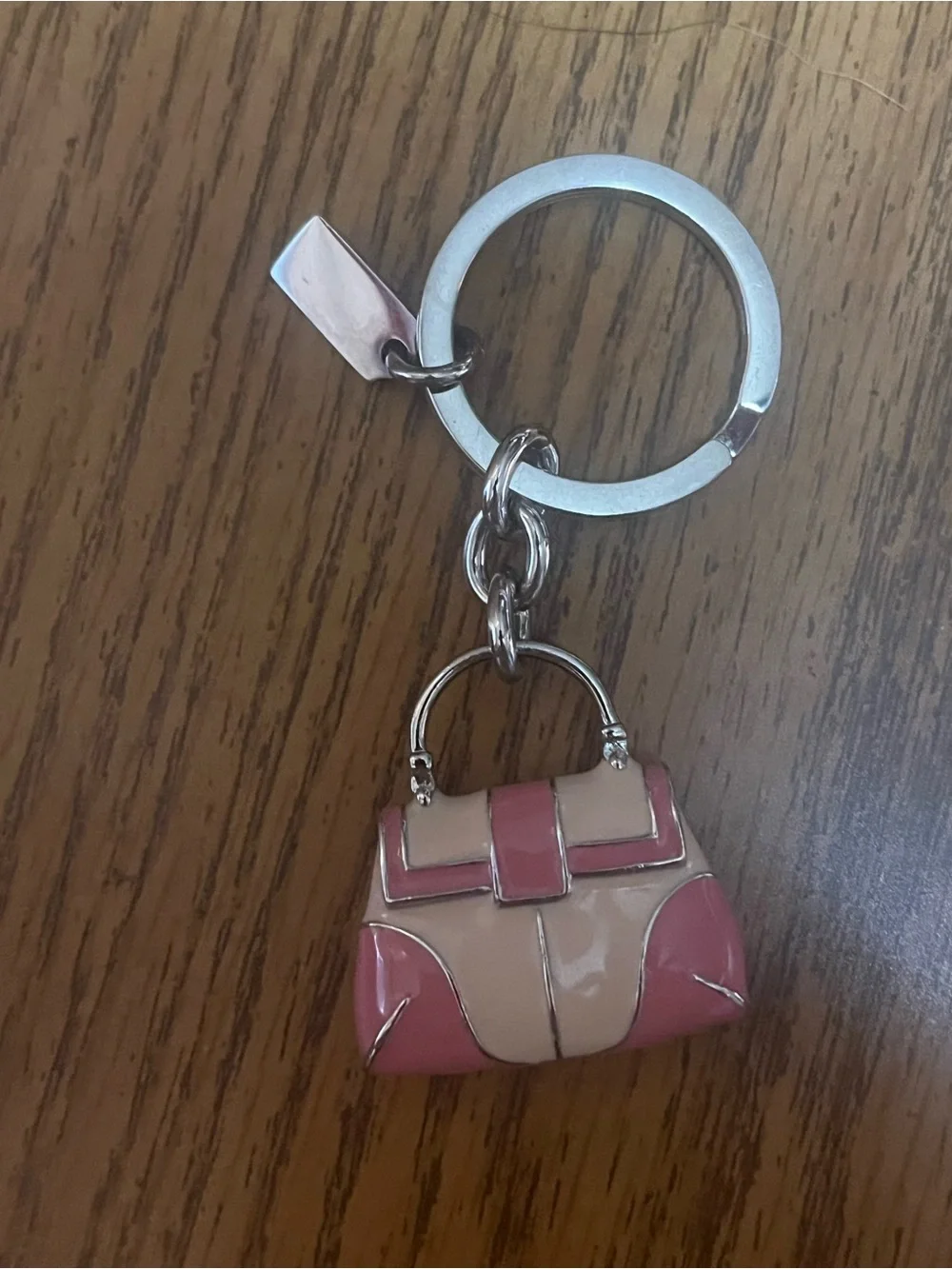 Coach Silver Keyring with Pink Logo Tag